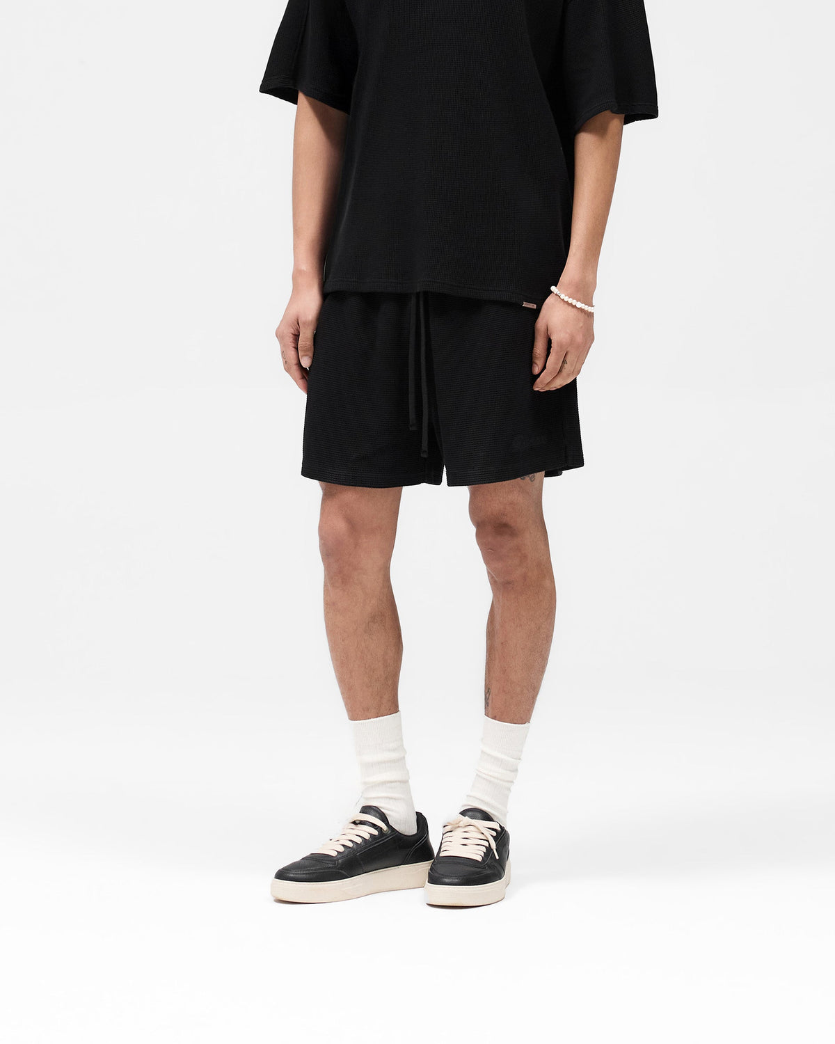 0044__0105_022125_SS25DROP2_WAFFLETSHIRT_WAFFLESHORT_JETBLACK_1_6929f223-b850-40e7-a202-8f450bff5e1b